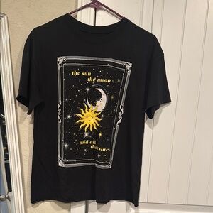 Black Graphic Tee with Sun and Moon Design